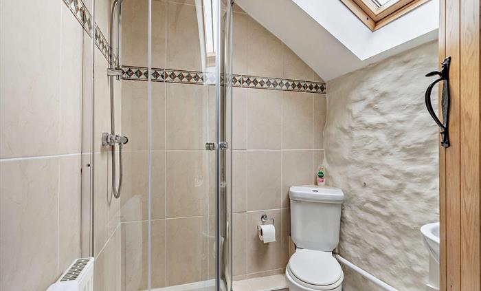 Room 5, sleeps 1 with a single bed & a shower en-suite
